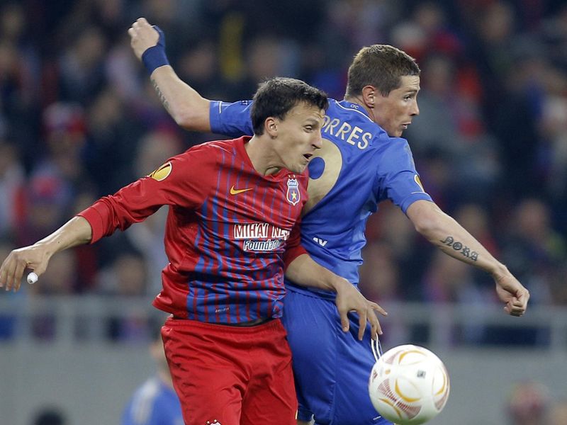 Fernando Torres competes with Vlad Chiriches in the air as the Blues battle in vain to get an equaliser