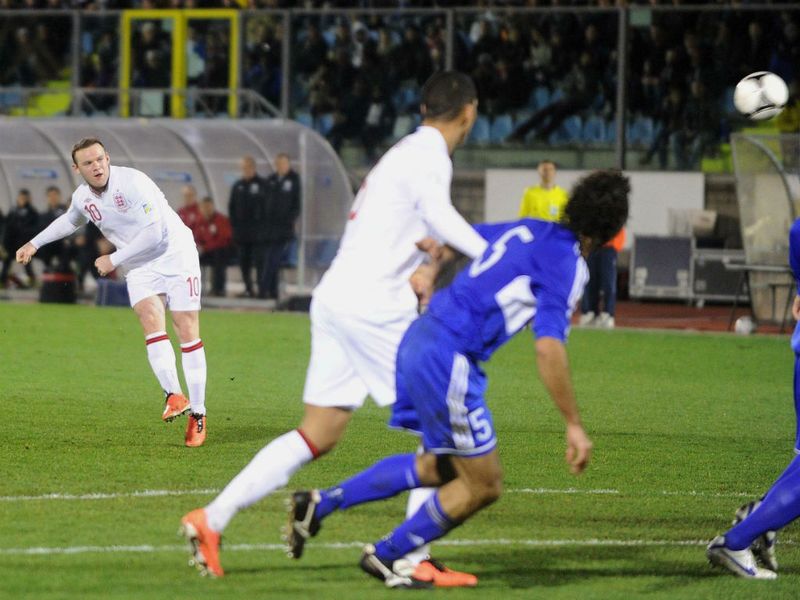 Wayne Rooney curls his free-kick into the bottom corner to make it 6-0.