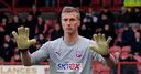 Moore flattered by speculation