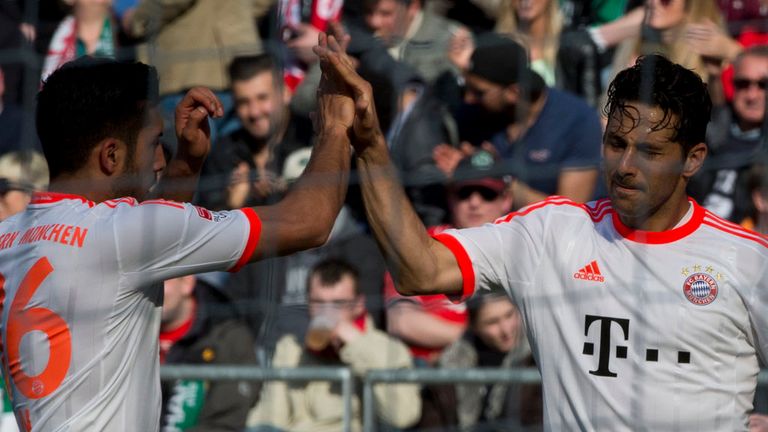 Claudio Pizarro (right): Celebrates goal in Bayern's win over Hannover