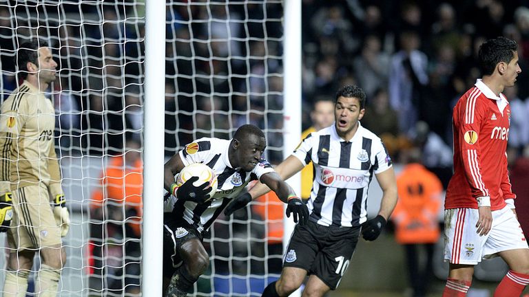 Papiss Cisse celebrates his goal with Hatem Ben Arfa