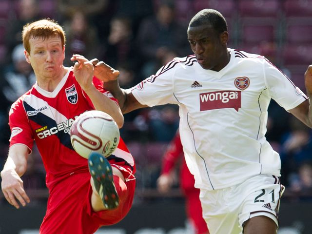 Scott Boyd (left) tussles with Michael Ngoo