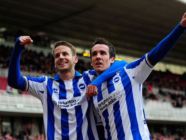 Andrea Orlandi and David Lopez celebrate for Brighton