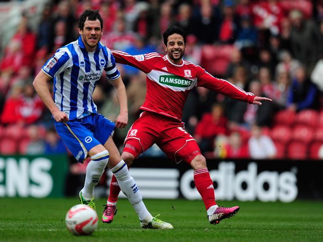 Gordon Greer and Merouane Zemmama battle for the ball