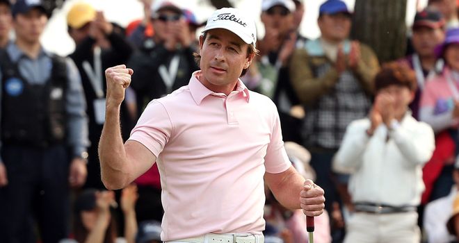 Brett Rumford: Celebrates his winning eagle