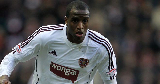 Michael Ngoo netted twice as Hearts stunned European hopefuls Ross County 4-2 at Tynecastle
