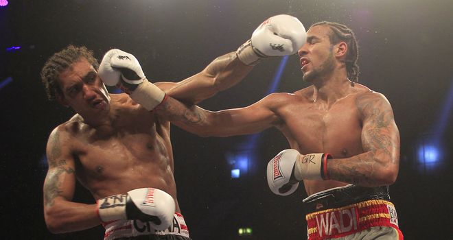China Clarke (L) gets the better of Wadi Camacho in a breakthrough fight at Wembley (Pic Lawrence Lustig)