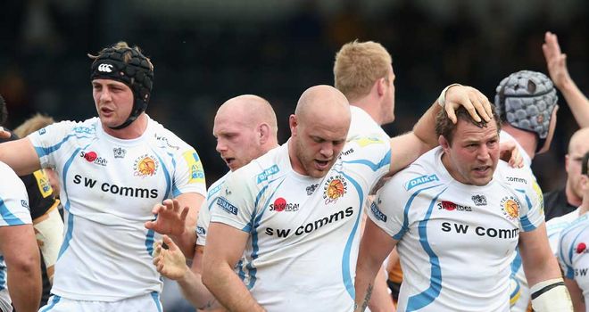 Exeter players celebrate scoring a try at Wasps