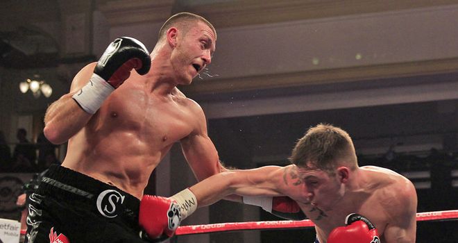 Scotty Cardle (L) delivered on his earlier promise against Maxi Hughes (Pic Lawrence Lustig)