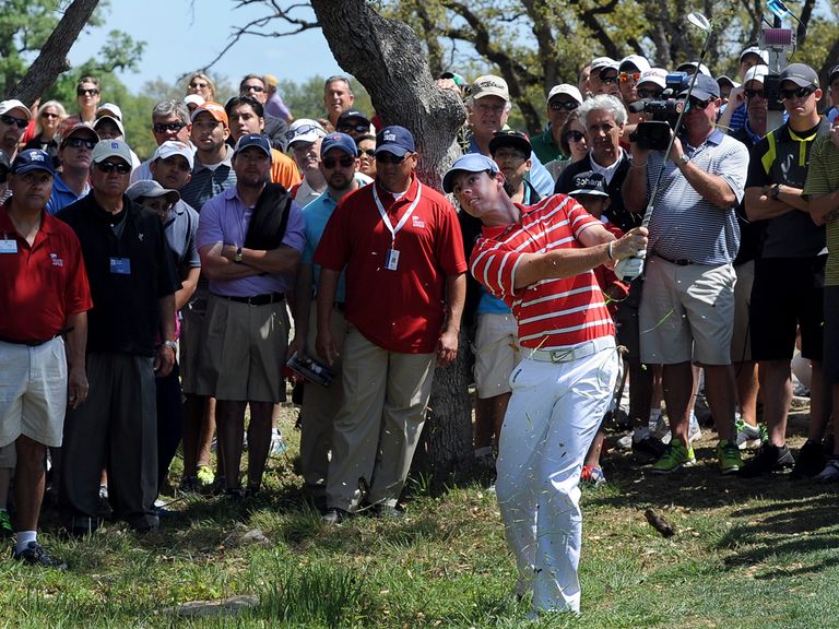 McIlroy: Four shots back