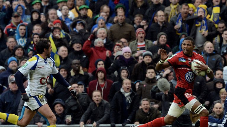 Delon Armitage waves at Brock James before scoring his try