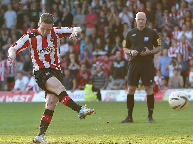 Adam Forshaw strokes home the game's decisive penalty