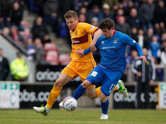 Shaun Hutchinson tackles Aaron Doran.