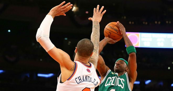 son Terry shoots against the New York Knicks