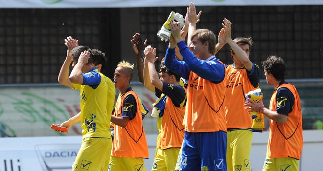 Chievo applaud their fans at the final whistle