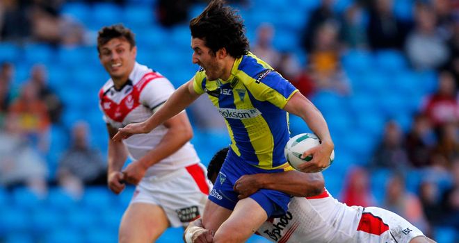 Warrington's Stefan Ratchford is tackled by Sia Soliola