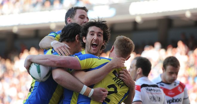 Warrington celebrate one of eight tries against St Helens