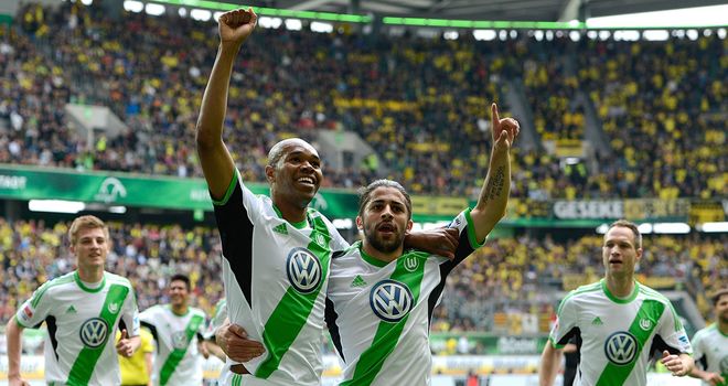 Wolfsburg's Naldo and Ricardo Rodriguez celebrate