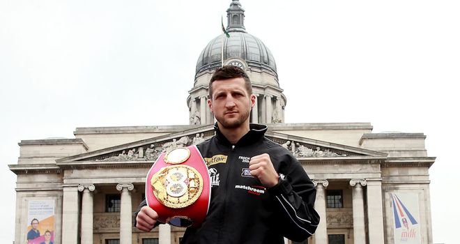 Carl Froch: Poses with his IBF belt in Nottingham's Market Square on Monday