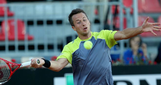 Philipp Kohlschreiber: Through to the second round with a straight sets win over Milos Raonic