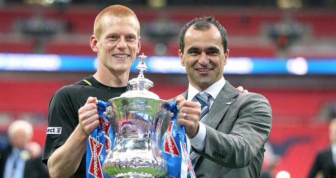 Ben Watson: Lifts the FA Cup with Wigan manager Roberto Martinez