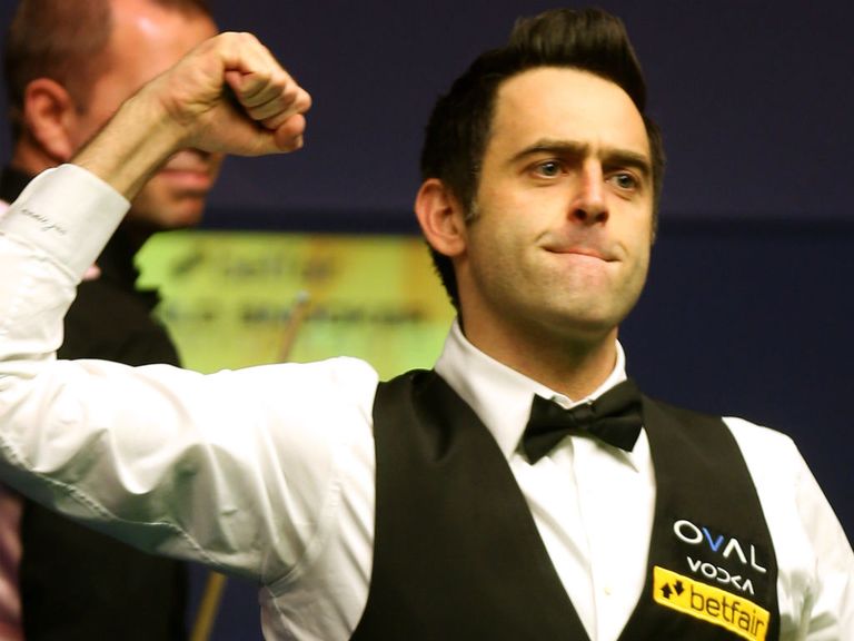 Ronnie O'Sullivan celebrates his victory.