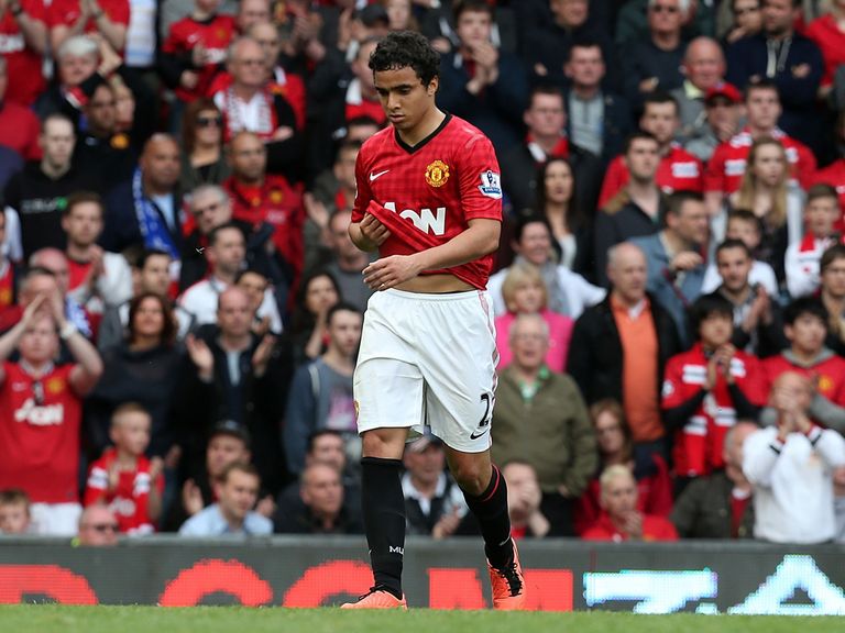 Rafael makes his way off the field after his red card.