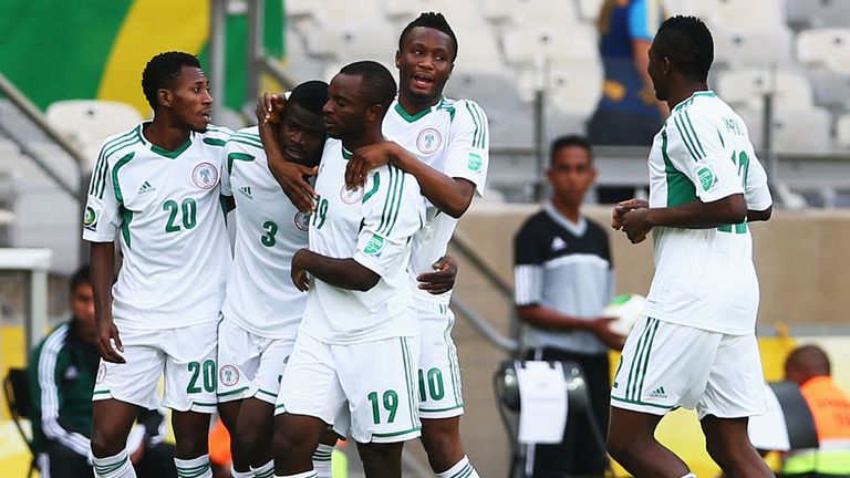 Uwa Elderson Echiejile: Celebrates after scoring the opening goal