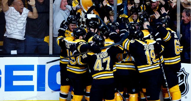 Boston Bruins celebrate beating the Pittsburgh Penguins