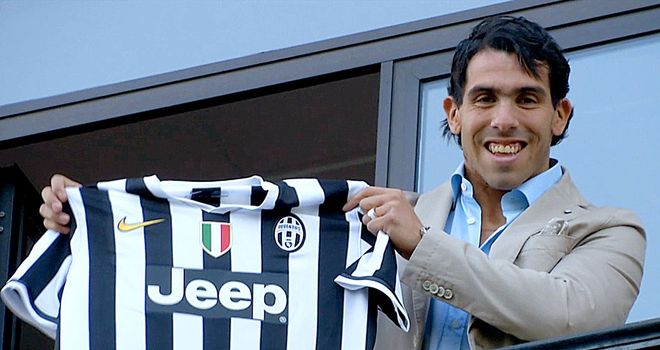 Carlos-Tevez-Juventus-Unveil-Shirt-2_2964424.jpg