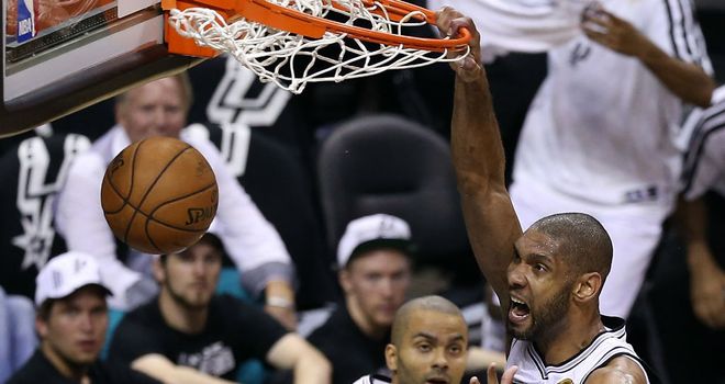Tim Duncan celebrates his slam dunk