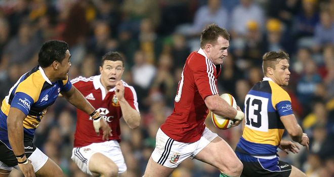 Stuart Hogg weaves through the Combined Country defence to score his side's third try