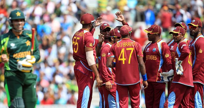 West Indies celebrate before Misbah is called back after review