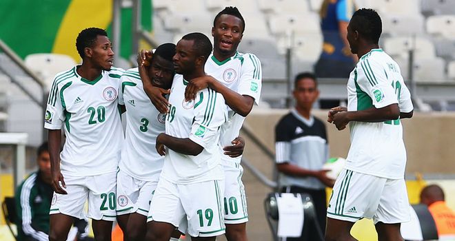 Uwa Elderson Echiejile: Celebrates after scoring the opening goal