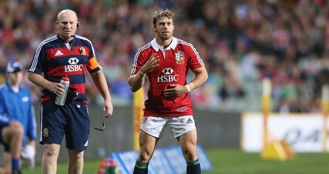Lions coach Neil Jenkins watches Leigh Halfpenny line up a kick