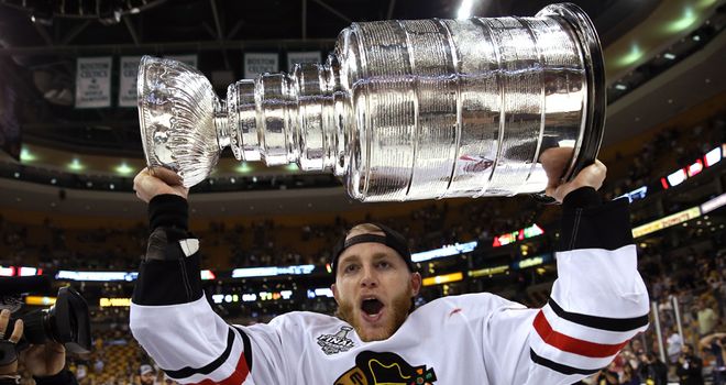 Patrick Kane: Celebrates with Stanley Cup after Game Six victory