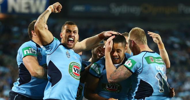 Blake Ferguson (arm raised): Celebrates try in State of Origin opener