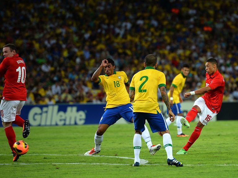 Alex Oxlade-Chamberlain scores against Brazil.