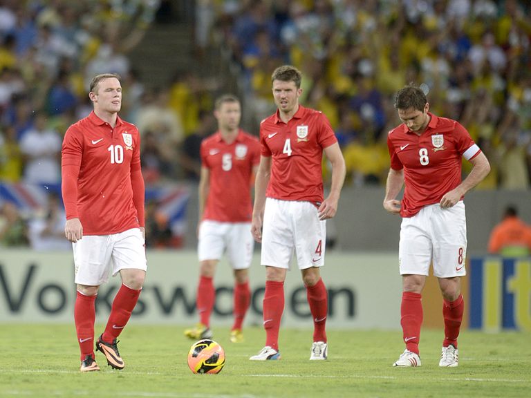 Michael Carrick has defended Wayne Rooney
