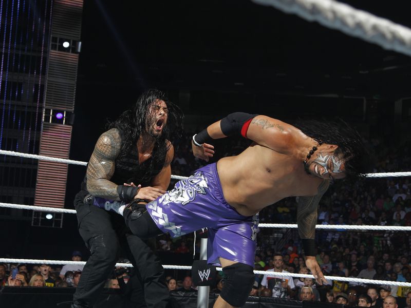 Jimmy Uso kicks out at Roman Reigns