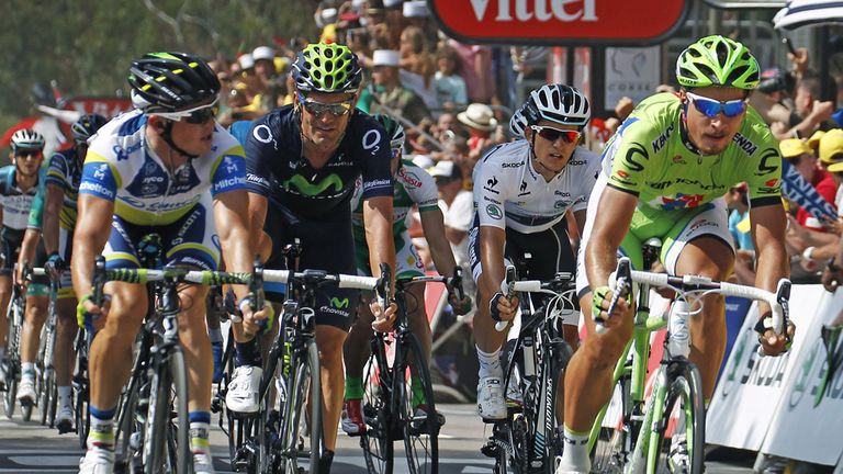 Simon Gerrans, left, held off Peter Sagan, right, to claim victory