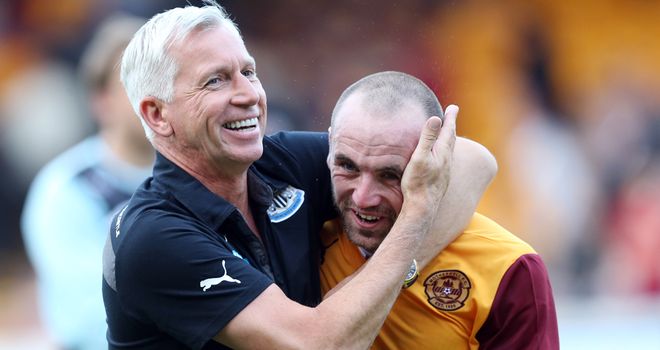 Newcastle boss Alan Pardew shares a joke with James McFadden after the final whistle