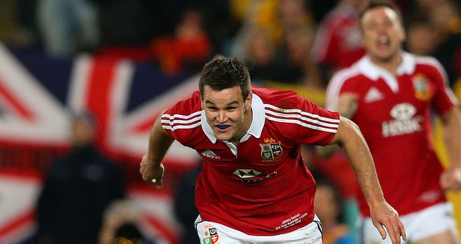 Jonathan Sexton celebrates after scoring the Lions' second try against Australia