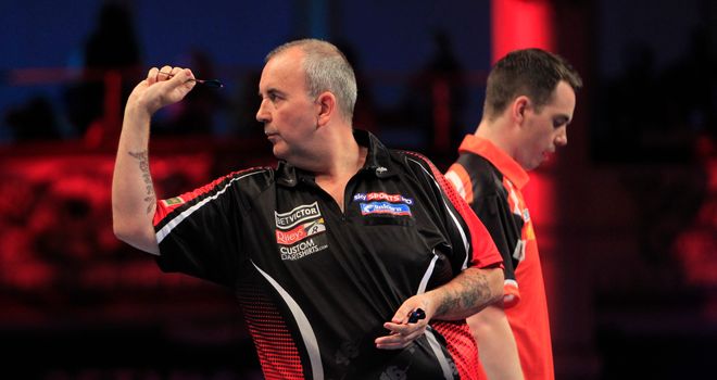 Phil Taylor beats Stuart Kellett at the World Matchplay at the Winter Gardens in Blackpool.