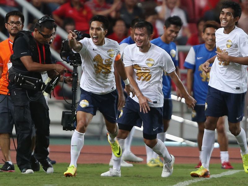Teerathep Winothai celebrates scoring the winning goal against United in Bangkok