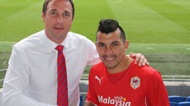 Malky Mackay welcomes his new signing (pic courtesy of Cardiff City FC)