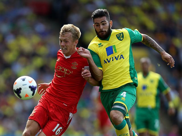 James Ward-Prowse and Bradley Johnson tangle.