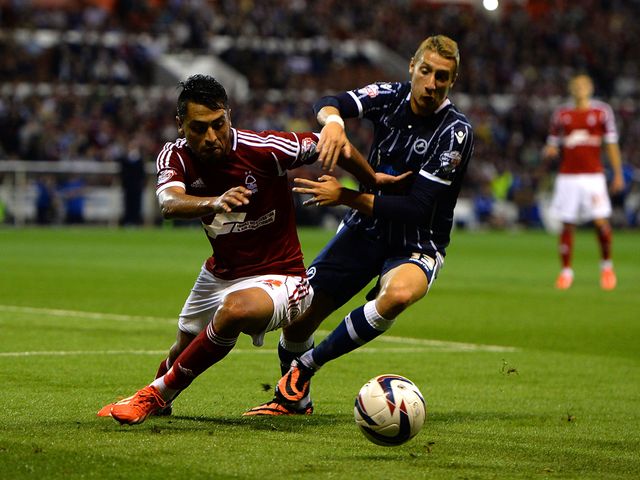 Gonzalo Jara of Nottingham Forest battles with Lee Martin