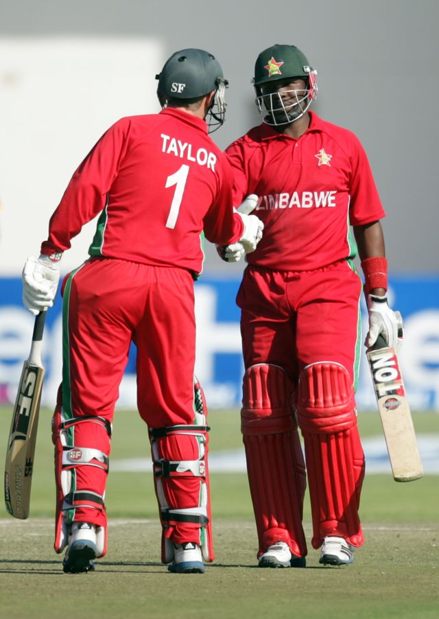 Hamilton Masakadza (right): Zimbabwe batsman congratulated by Brendan Taylor on his 20th ODI half-century