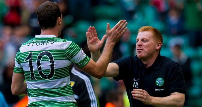 Celtic striker Anthony Stokes is congratulated by manager Neil Lennon after scoring his second goal